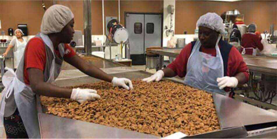 Praline pecans are carefully sorted in our Alabama Kitchen